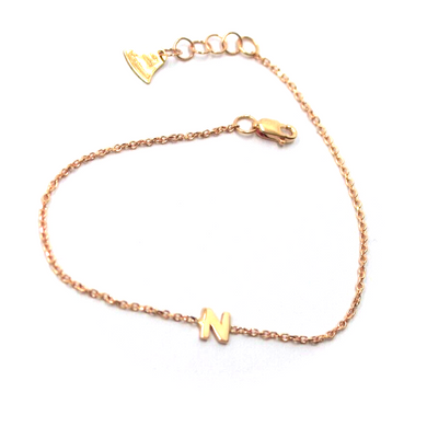 18k rose gold rolo thin bracelet with central small 5mm letter initial N.