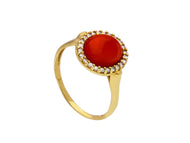 18K YELLOW GOLD CENTRAL CABOCHON RED CORAL RING WITH CUBIC ZIRCONIA FRAME.