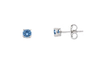 18k white gold stud four prong earrings with round 4mm blue cubic zirconia.