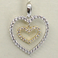 18k yellow and white gold heart double pendant charm with cubic zirconia.