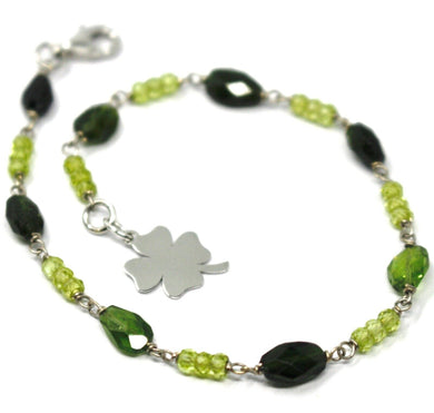 18k white gold bracelet, oval green tourmaline, peridot four leaf clover pendant.