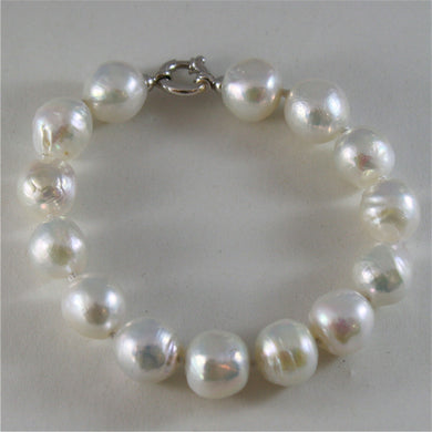 18k white gold bracelet with strand of white fw pearls 7.87 inches made in Italy.