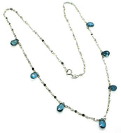 18k white gold necklace drop faceted london topaz, oval alternate bright chain.