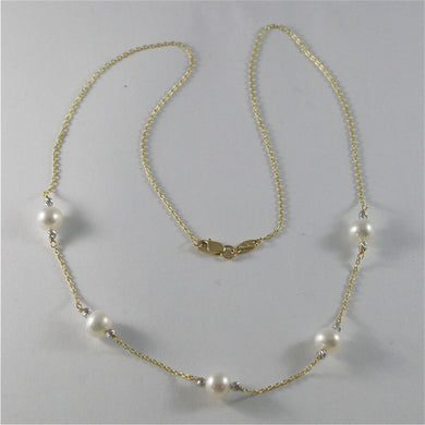 18k yellow gold necklace with round white 6 7 mm freshwater pearls made in Italy.