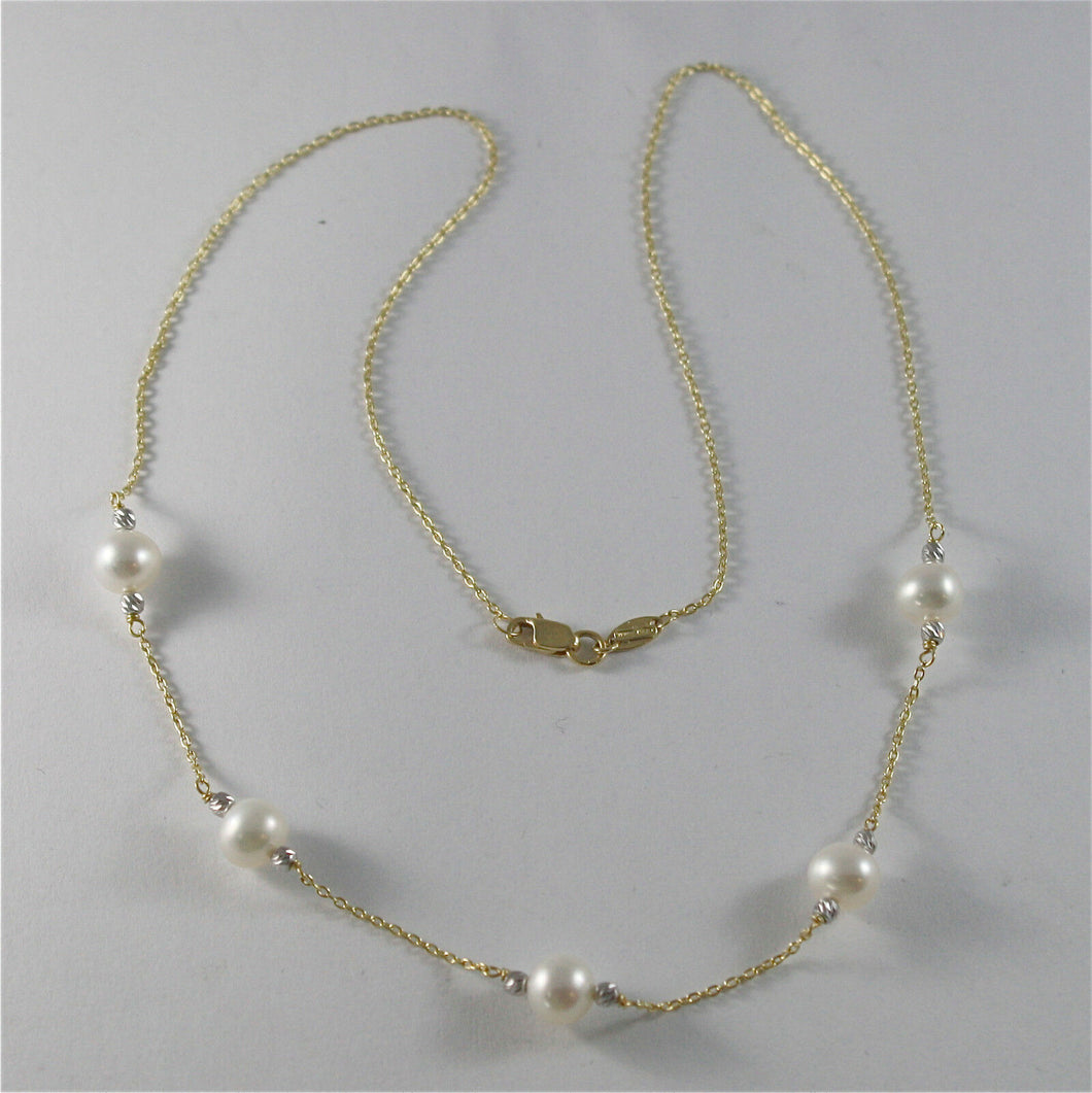 18k yellow gold necklace with round white 6 7 mm freshwater pearls made in Italy.