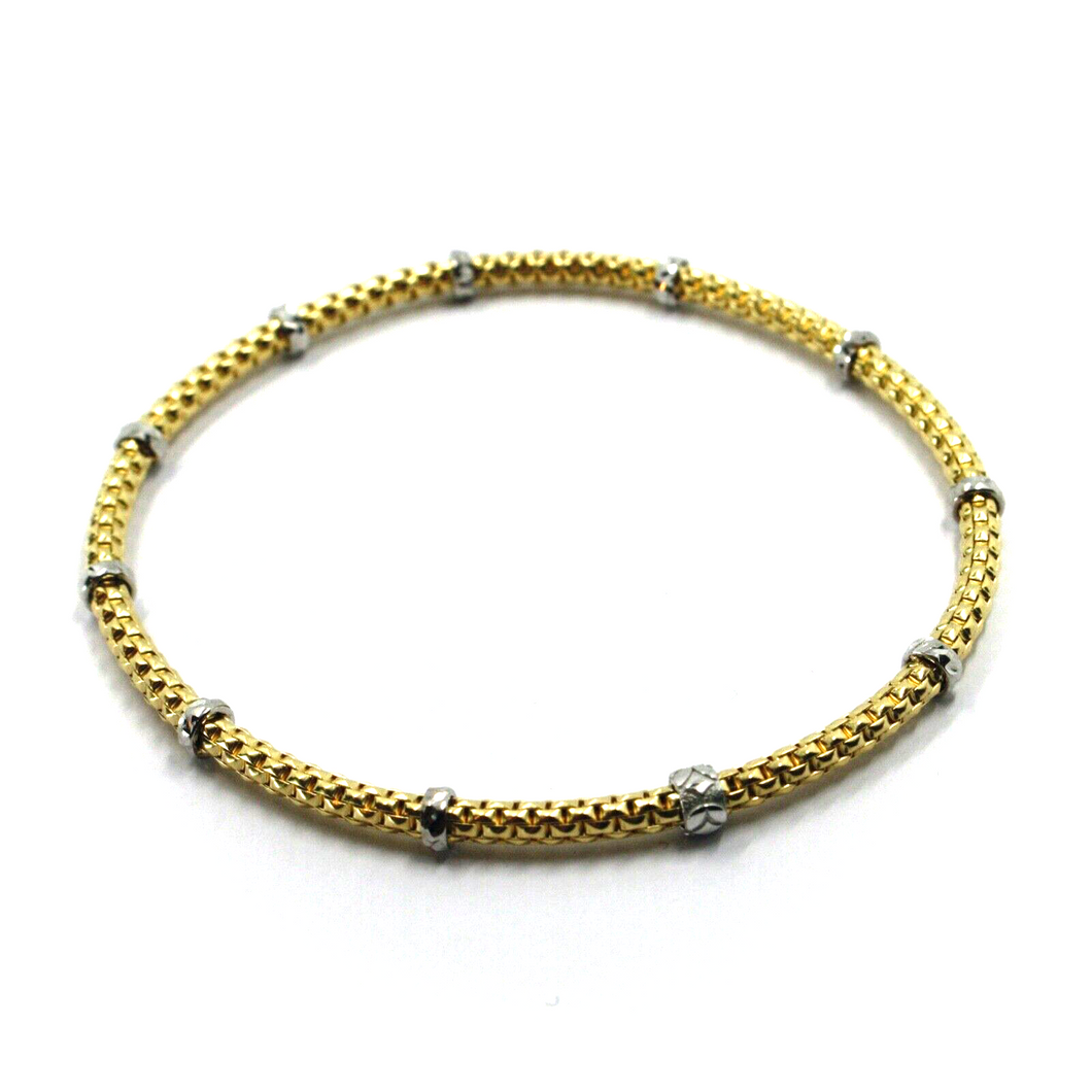 18k yellow white gold elastic bracelet, 3mm basket popcorn tube, worked discs.