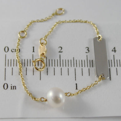 18k yellow gold bracelet 5.7 inches with white pearl and plate made in Italy.
