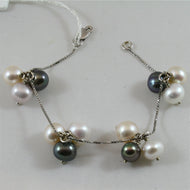 18k white gold bracelet with black, white, rose and purple pearls, made in Italy.