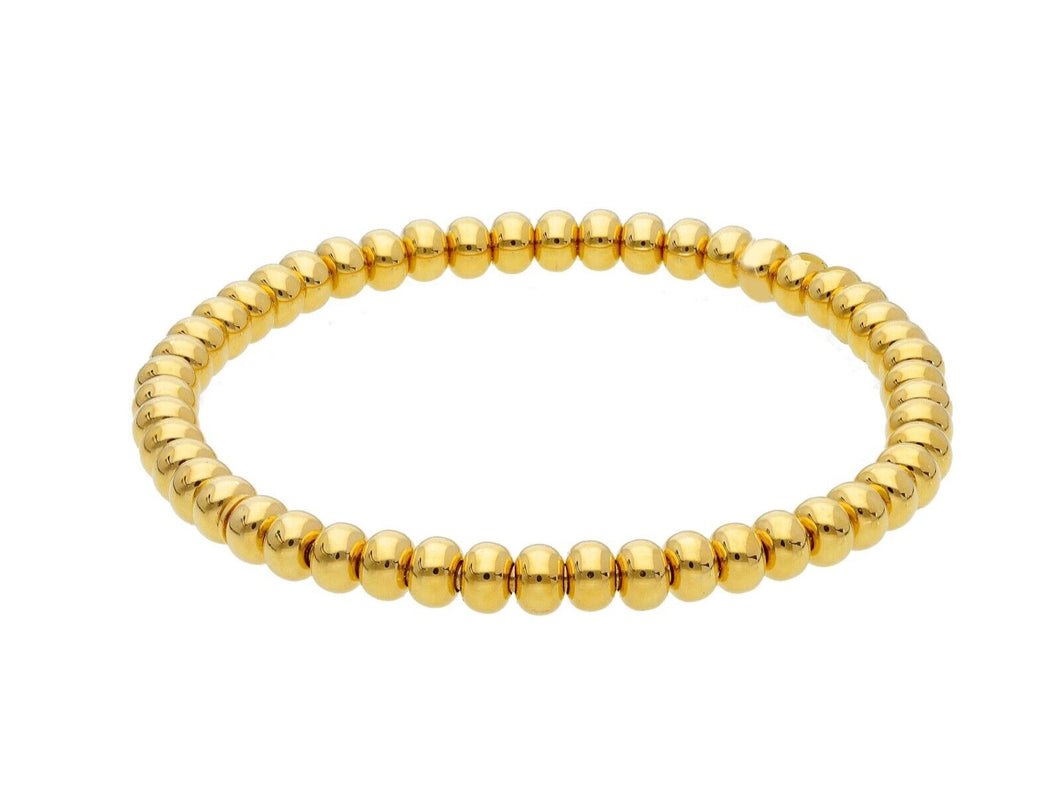 18k yellow gold elastic bracelet, tubes discs ovals diameter 5mm 0.2