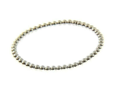 18k white gold bracelet, semirigid, elastic, 4 mm smooth balls spheres.