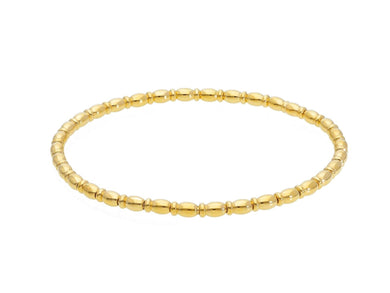 18k yellow gold elastic bracelet, alternate tubes ovals & discs width 3mm 0.12