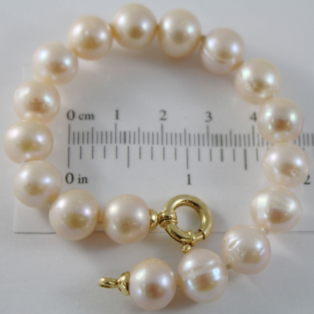 18k yellow gold bracelet 7.5 inches with rose 10 mm fw pearls, made in Italy.
