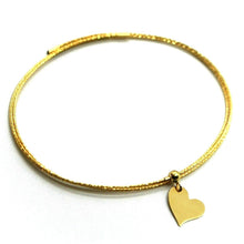 Load image into Gallery viewer, 18k yellow gold magicwire bangle bracelet elastic worked 3 wires, heart pendant.
