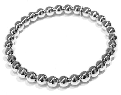 18k white gold bracelet, semirigid, elastic, big 6 mm smooth balls spheres.