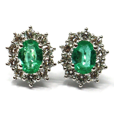 18k white gold earrings, flower, oval emeralds 1.16 & diamonds frame 1.12 carats.