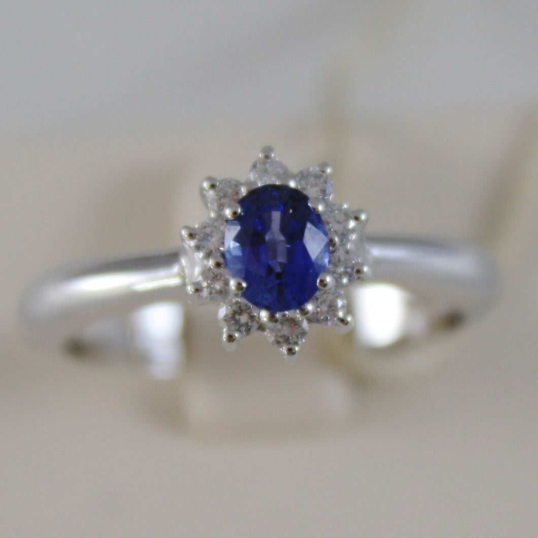 18k white gold flower ring, diamond & oval blue sapphire, 0.65 made in Italy