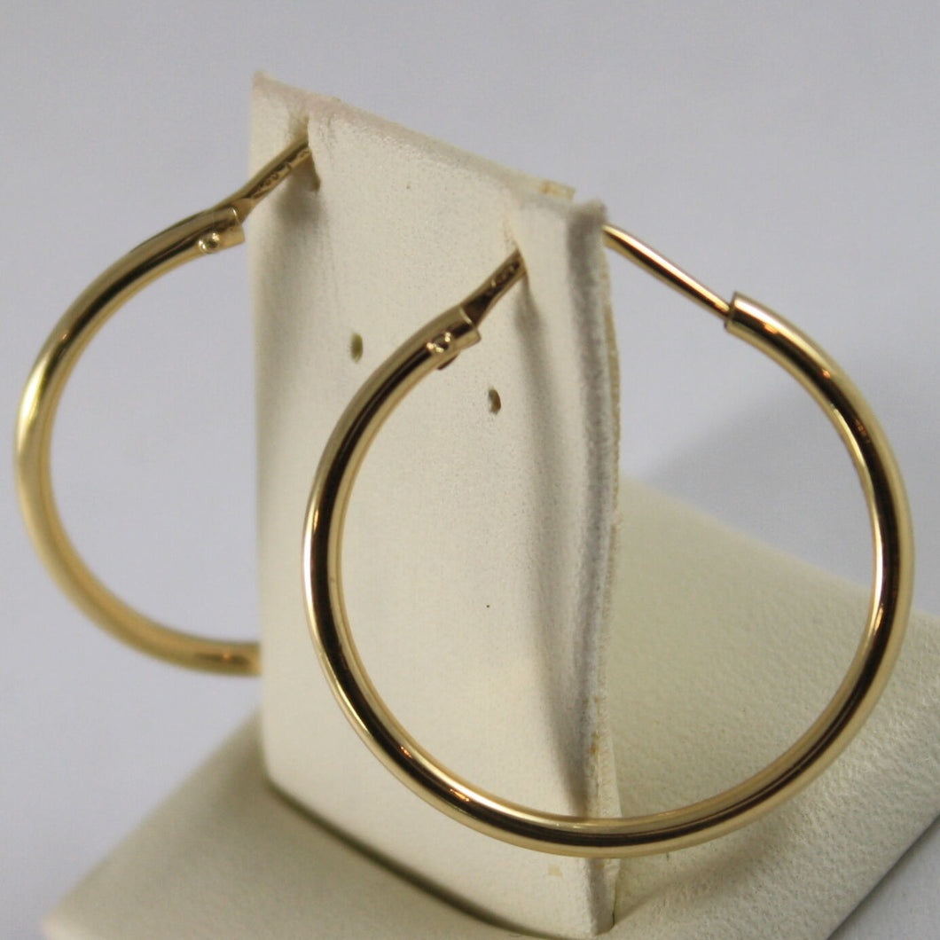 18K YELLOW GOLD CIRCLE EARRINGS HOOP, TUBE, DIAMETER 0.98 INCHES MADE IN ITALY.
