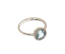 Load image into Gallery viewer, 18k white gold ring cushion round blue topaz and cubic zirconia frame.
