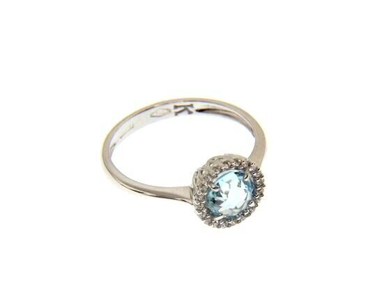 18k white gold ring cushion round blue topaz and cubic zirconia frame.