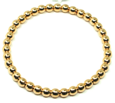 18k yellow gold bracelet, semirigid, elastic, big 5 mm smooth balls spheres.
