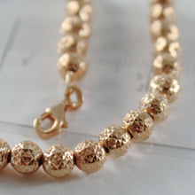 Load image into Gallery viewer, 18k rose pink gold bracelet with finely worked spheres 5 mm balls made in Italy.
