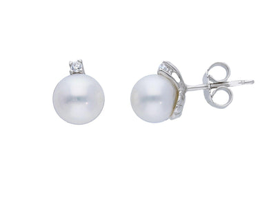 18k white gold earrings 7/7.5mm freshwater white round pearls, cubic zirconia.