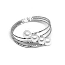 Load image into Gallery viewer, 18k white gold Magicwire band ring, elastic worked multi wires, diagonal pearls.
