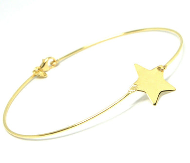 18k yellow gold bangle thin bracelet, semi rigid, central flat star.