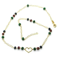 18k yellow gold heart necklace, faceted green emerald, red ruby, blue sapphire.