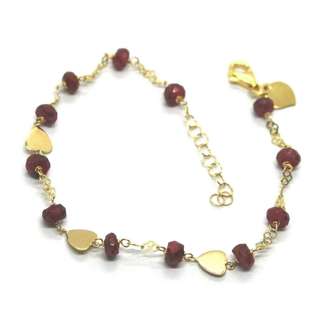 18k yellow gold bracelet, alternate 4mm red ruby discs with flat hearts, 7.1