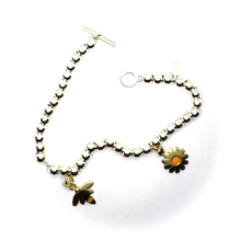 Load image into Gallery viewer, 925 STERLING SILVER SPHERE BRACELET 9K YELLOW GOLD ENAMEL BEE AND DAISY PENDANTS.
