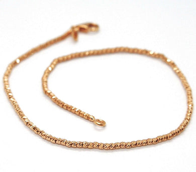 18k rose gold bracelet with finely worked spheres, 1.5 mm diamond cut balls.