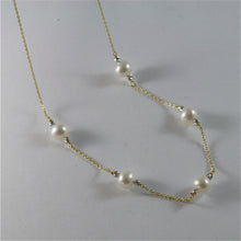 Load image into Gallery viewer, 18k yellow gold necklace with round white 6 7 mm freshwater pearls made in Italy.
