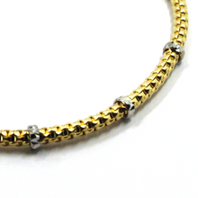 Load image into Gallery viewer, 18k yellow white gold elastic bracelet, 3mm basket popcorn tube, worked discs.
