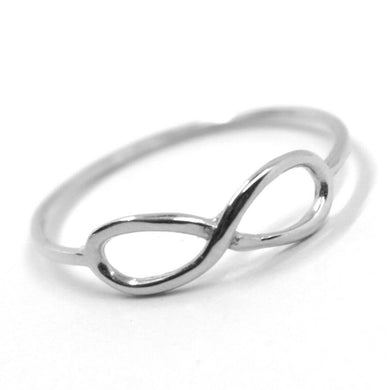 18k white gold infinite central ring, infinity, smooth, bright, made in Italy.