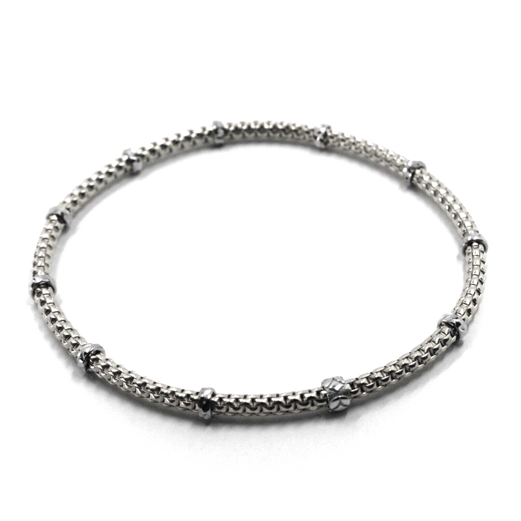 18k white gold elastic bracelet, alternate 3mm basket popcorn tube, worked discs.