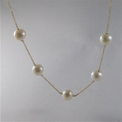 18k yellow gold necklace with round white freshwater pearls made in Italy.