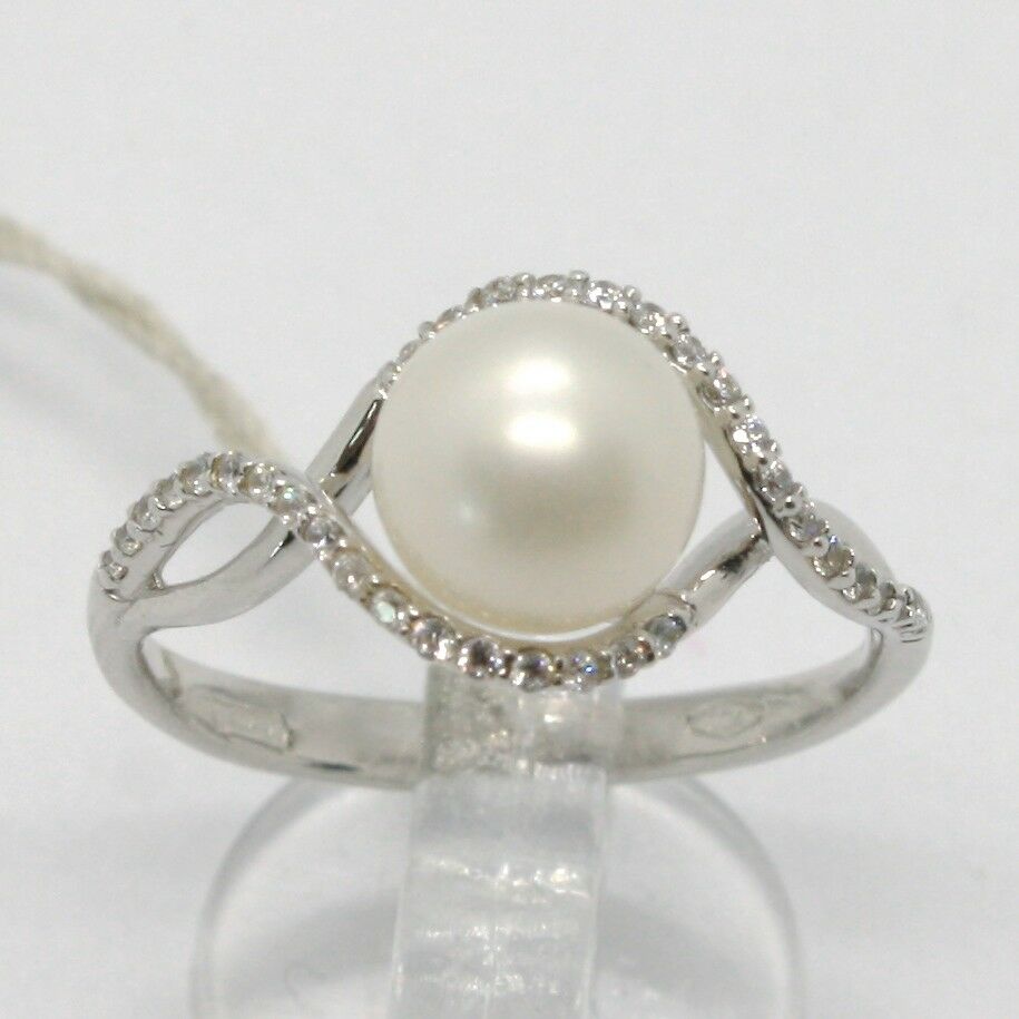 18k white gold band pearl zirconia ring ondulate, wave, braided.