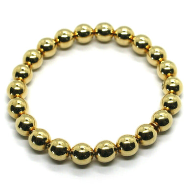 18k yellow gold bracelet, semirigid, elastic, big 8 mm smooth balls spheres.