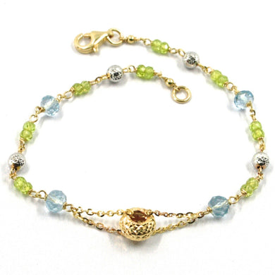 18K YELLOW WHITE GOLD BRACELET, AQUAMARINE, PERIDOT, DIAMOND CUT BALLS AND DISC.