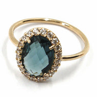 SOLID 18K ROSE GOLD FLOWER RING, BLUE CUSHION OVAL CRYSTAL CUBIC ZIRCONIA FRAME.