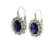 18k white gold flower leverback earrings big 7x9mm oval blue crystal, zirconia.