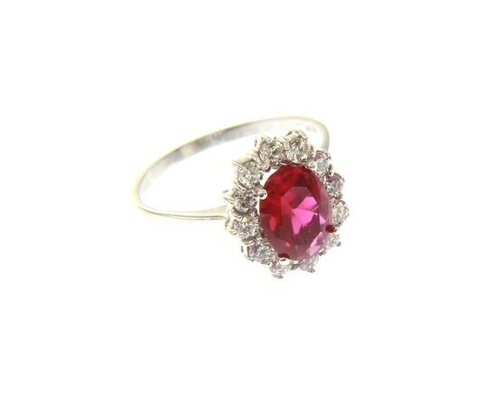SOLID 18K WHITE GOLD FLOWER RING OVAL RED CRYSTAL AND CUBIC ZIRCONIA FRAME.