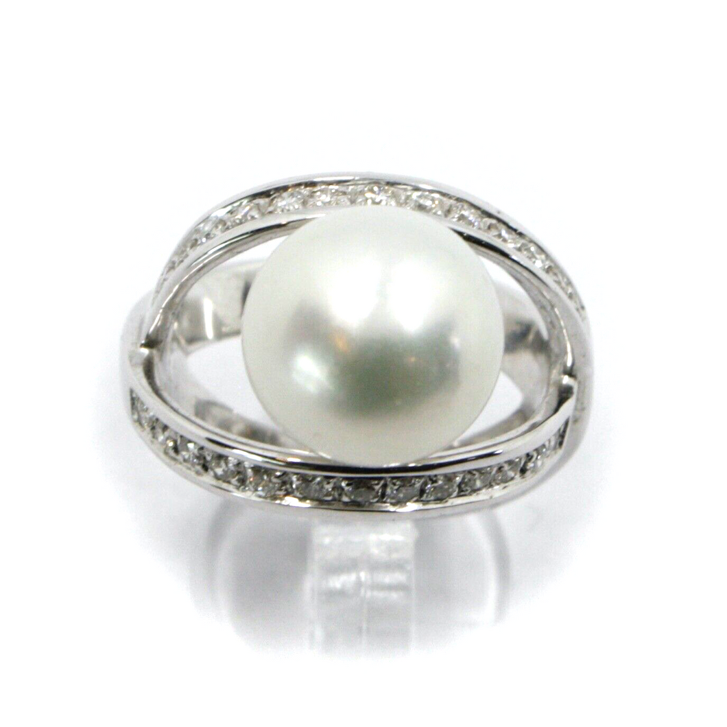 18k white gold doble crossed ring, big australian 12mm pearl and diamonds frame.