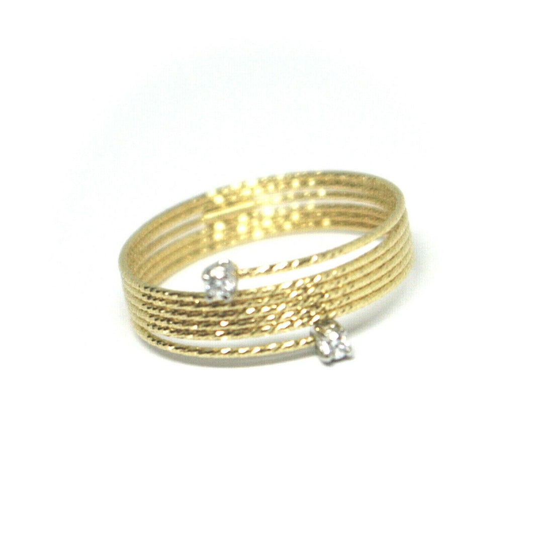 18k yellow gold magicwire ring, multi wires elastic worked, contrarié, diamond.