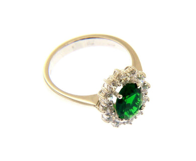 18k white gold flower ring big oval 9x7mm green crystal, cubic zirconia frame.