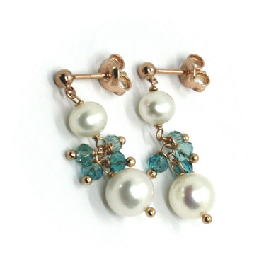18k rose gold pendant earrings, with white pearls and bunch of blue crystals.