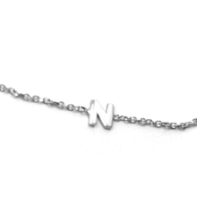 Load image into Gallery viewer, 18k white gold rolo thin bracelet with central small 5mm letter initial N.
