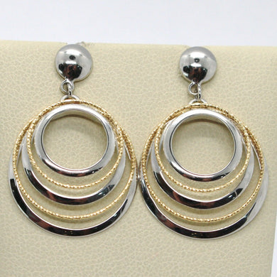 18K YELLOW WHITE GOLD PENDANT EARRINGS ALTERNATE WORKED CIRCLES, MADE IN ITALY.