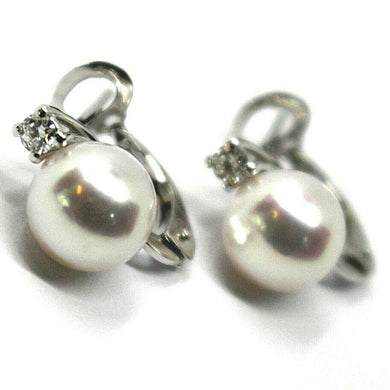 solid 18k white gold clips earrings, saltwater akoya pearls 8.5/9 mm, diamonds.